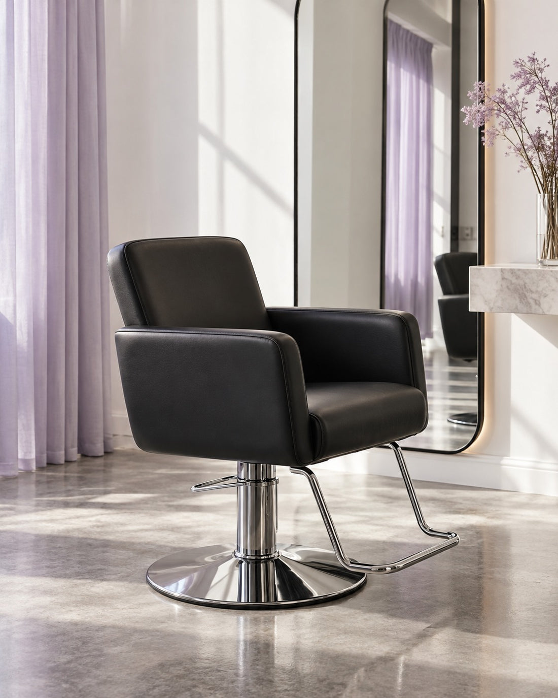 Black salon chair in a white and lilac beauty studio